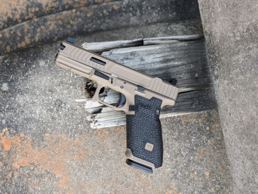 Glock 17 With Guardian Slide, Signature Frame Package, and FDE Cerakote