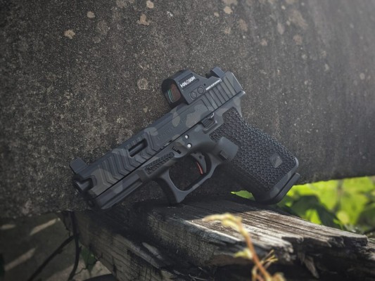 Glock 19 Black Multicam Cerakote, Signature Stippling Package, Guardian slide, and Guardian Stippling