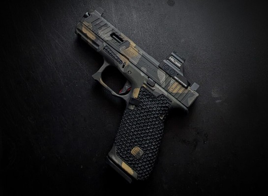 Signature Package With Guardian Stippling & Guardian Slide. Gold, Titanium, and OD Green Multicam With Distressing